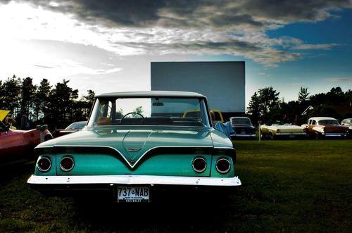 old car at drive in movie