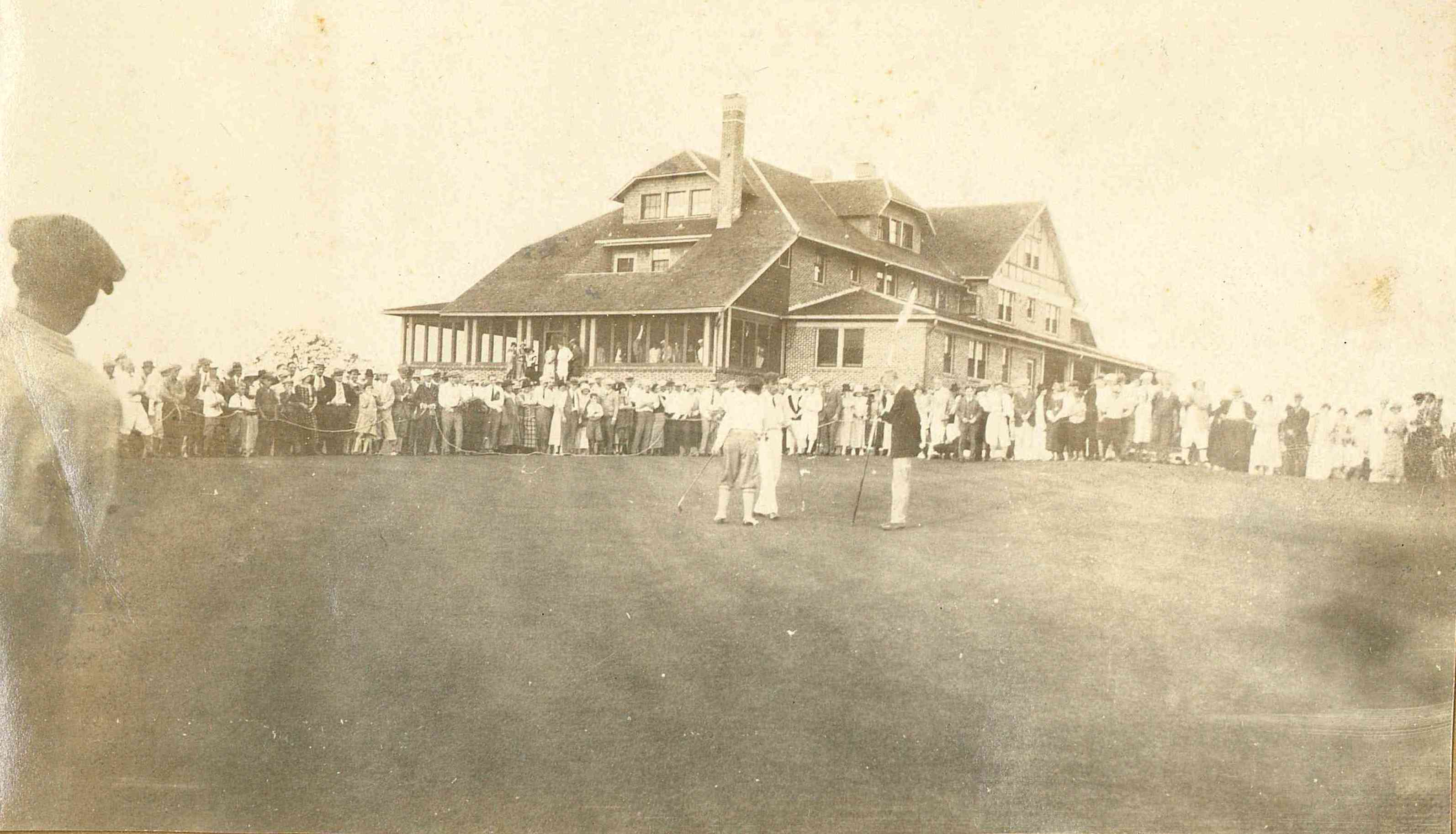 a group of people standing outside a building