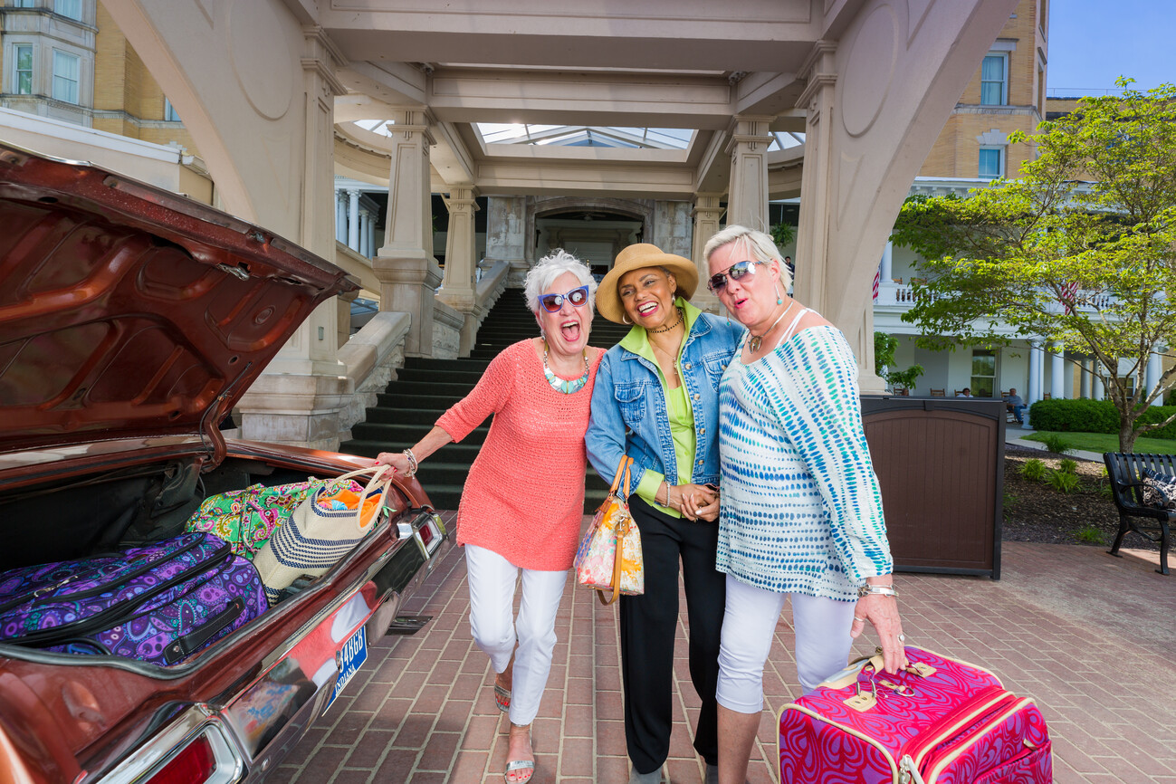 Ladies unpacking truck for girls weekend