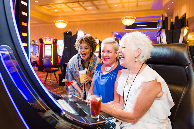 ladies at slot machine