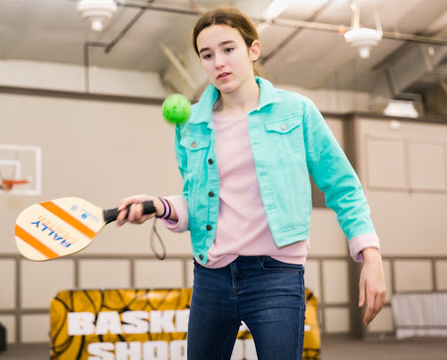 Girl Playing Pickleball