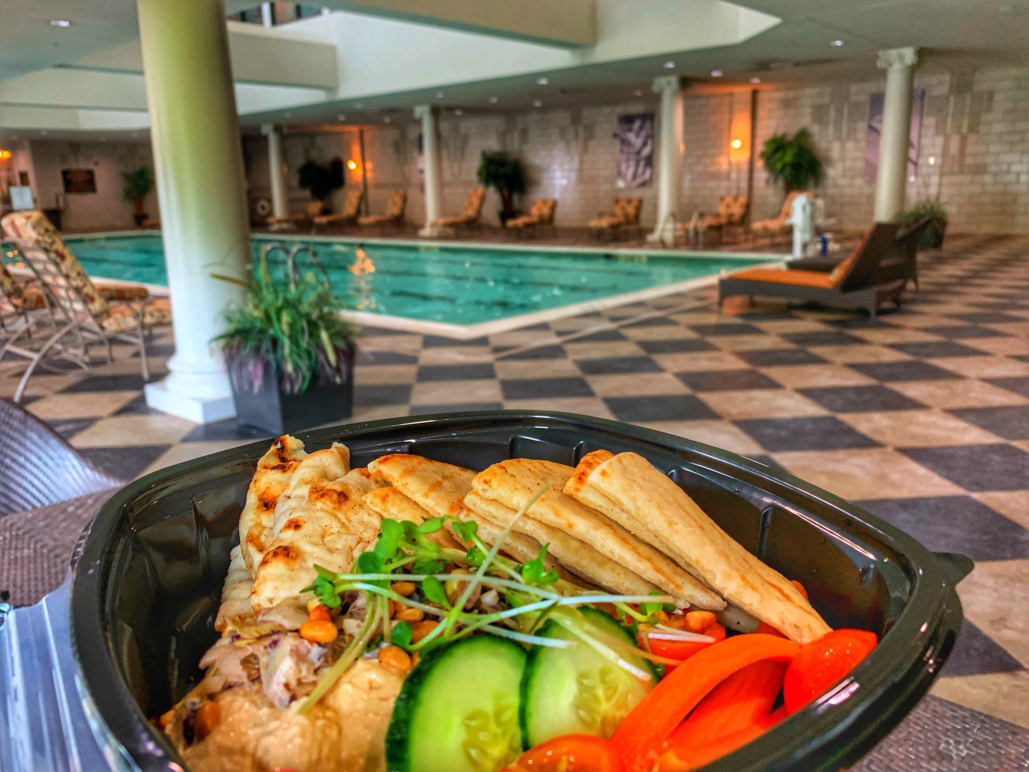 a bowl of food in a pool