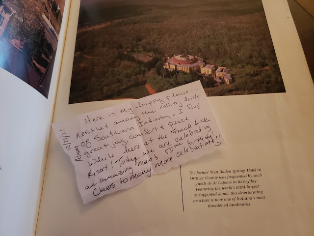 hand written letter in pages of book