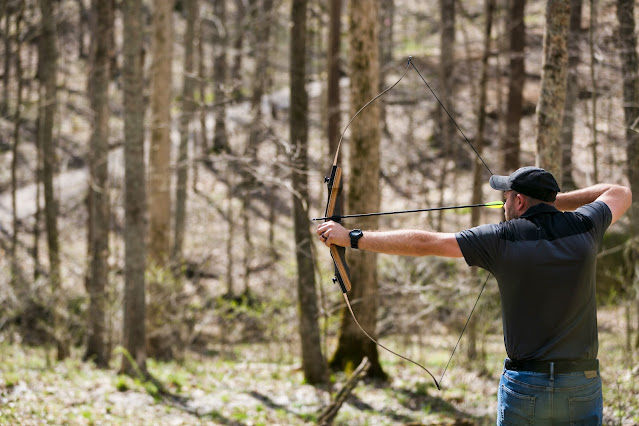 man with bow drawn