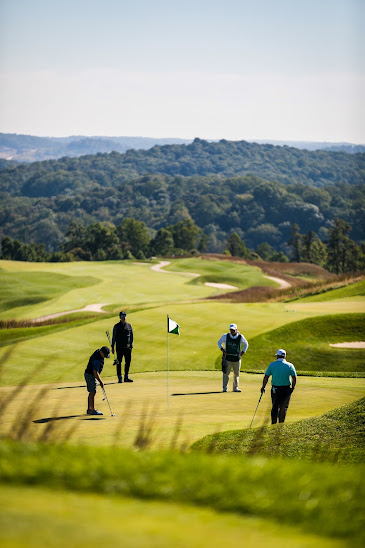 distant shot of golfers on green at French Lick Resort