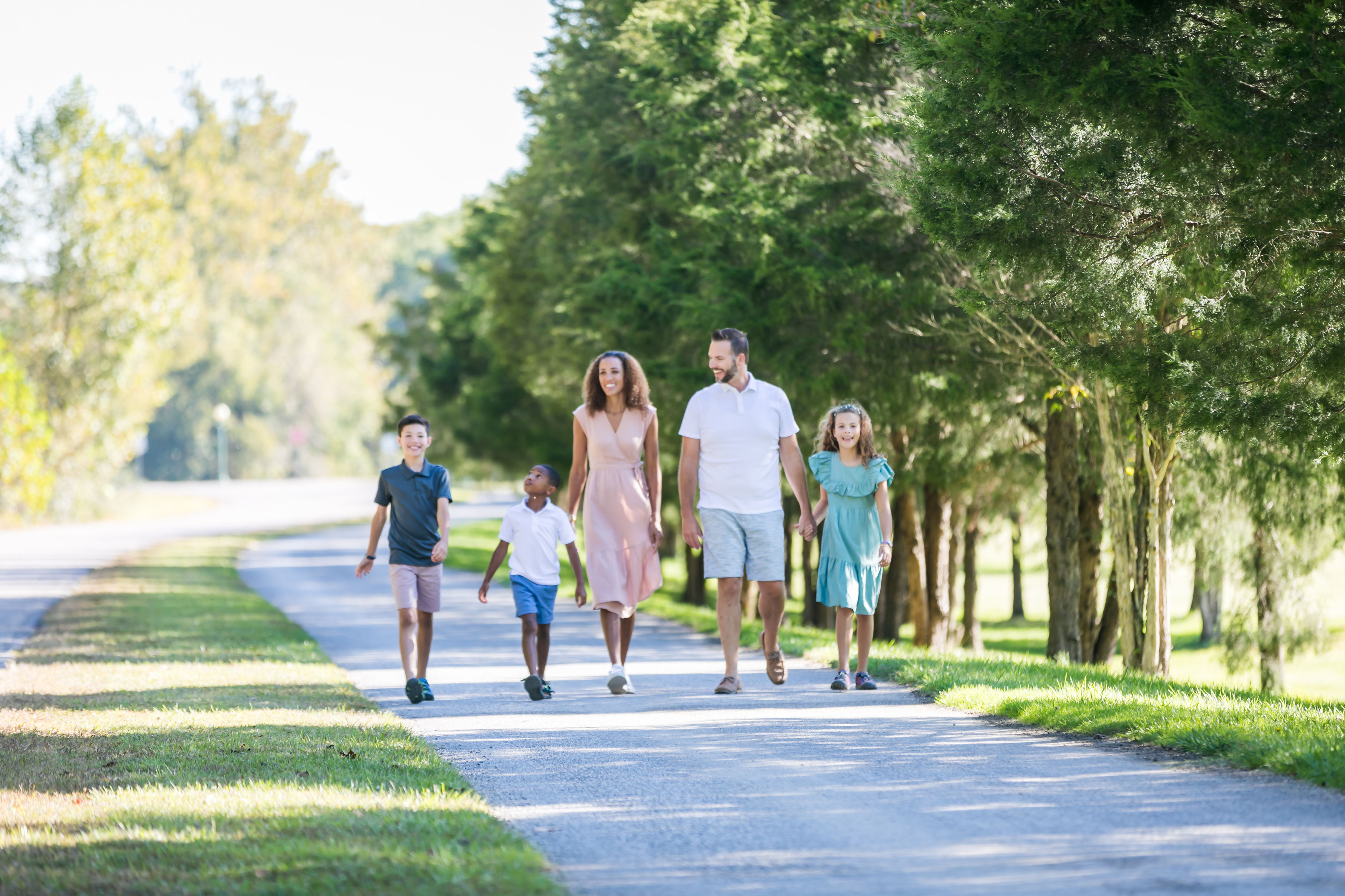 a family walking on a path