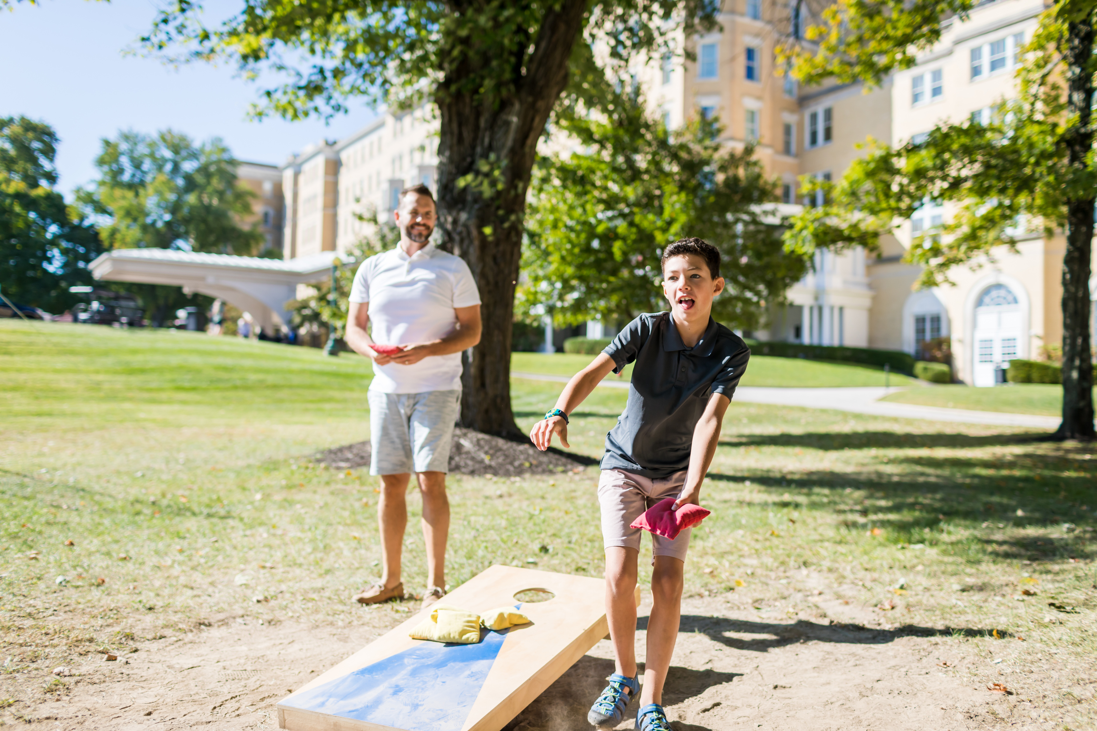 a man and boy playing a game