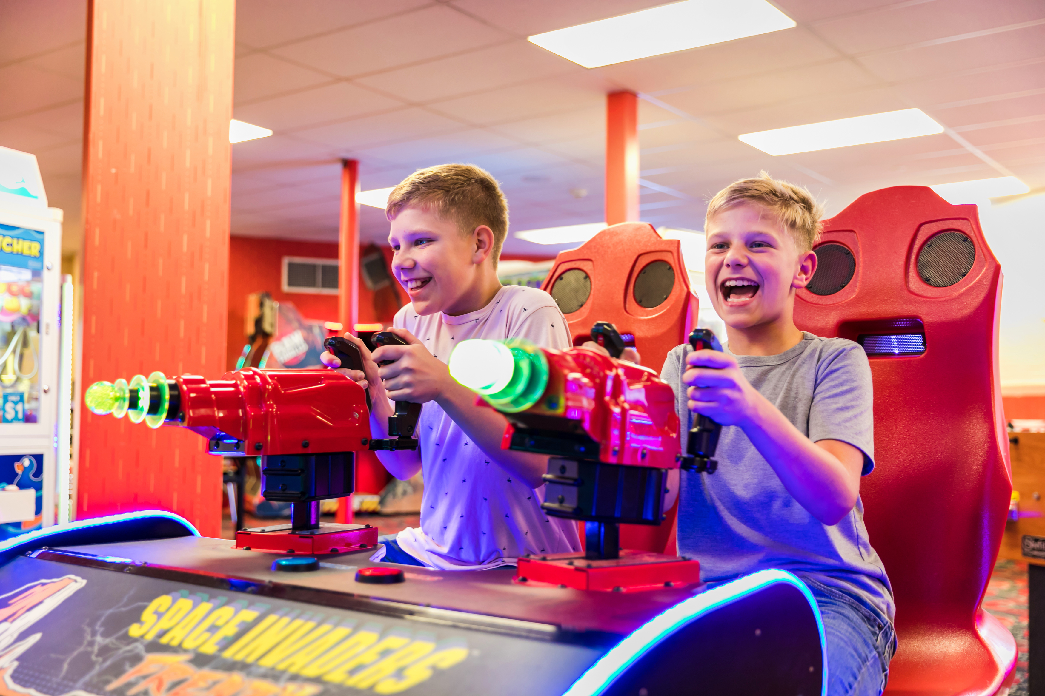 Children playing arcade games