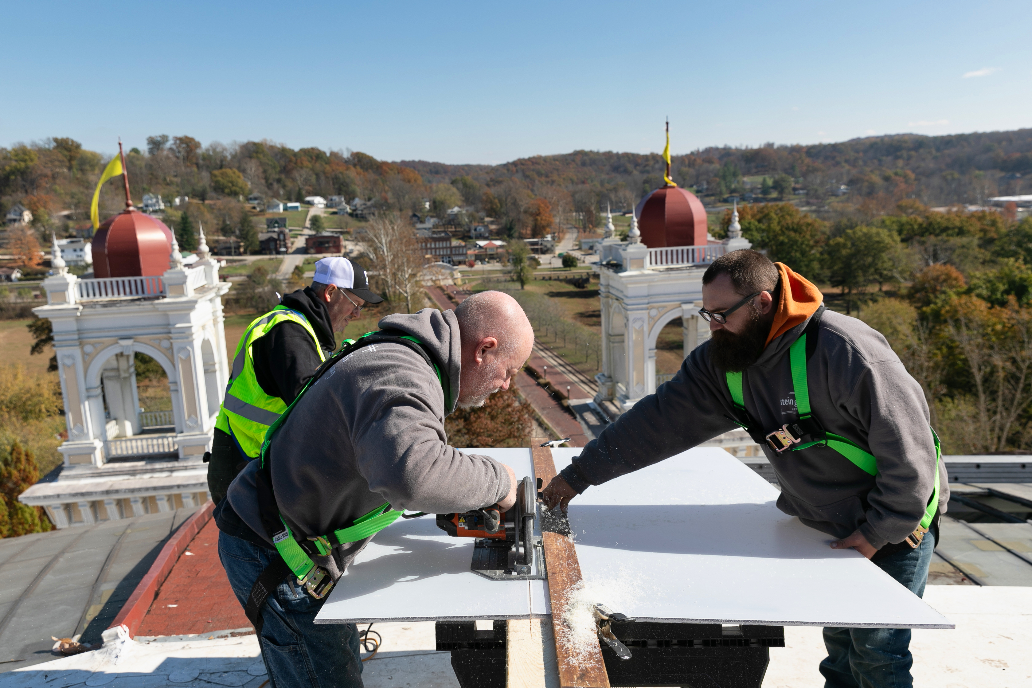 a group of men working on a building