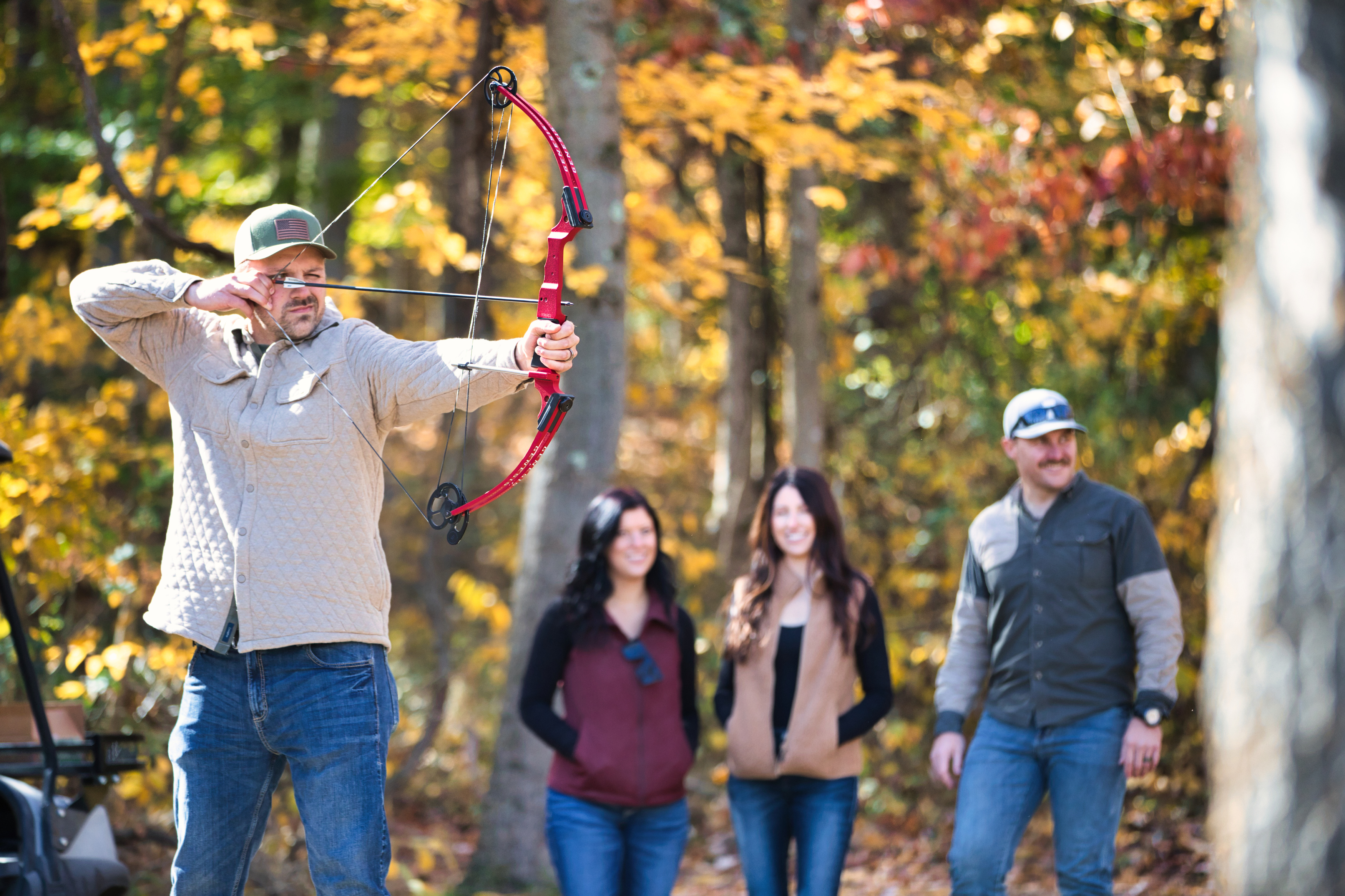 a man holding a bow and arrow