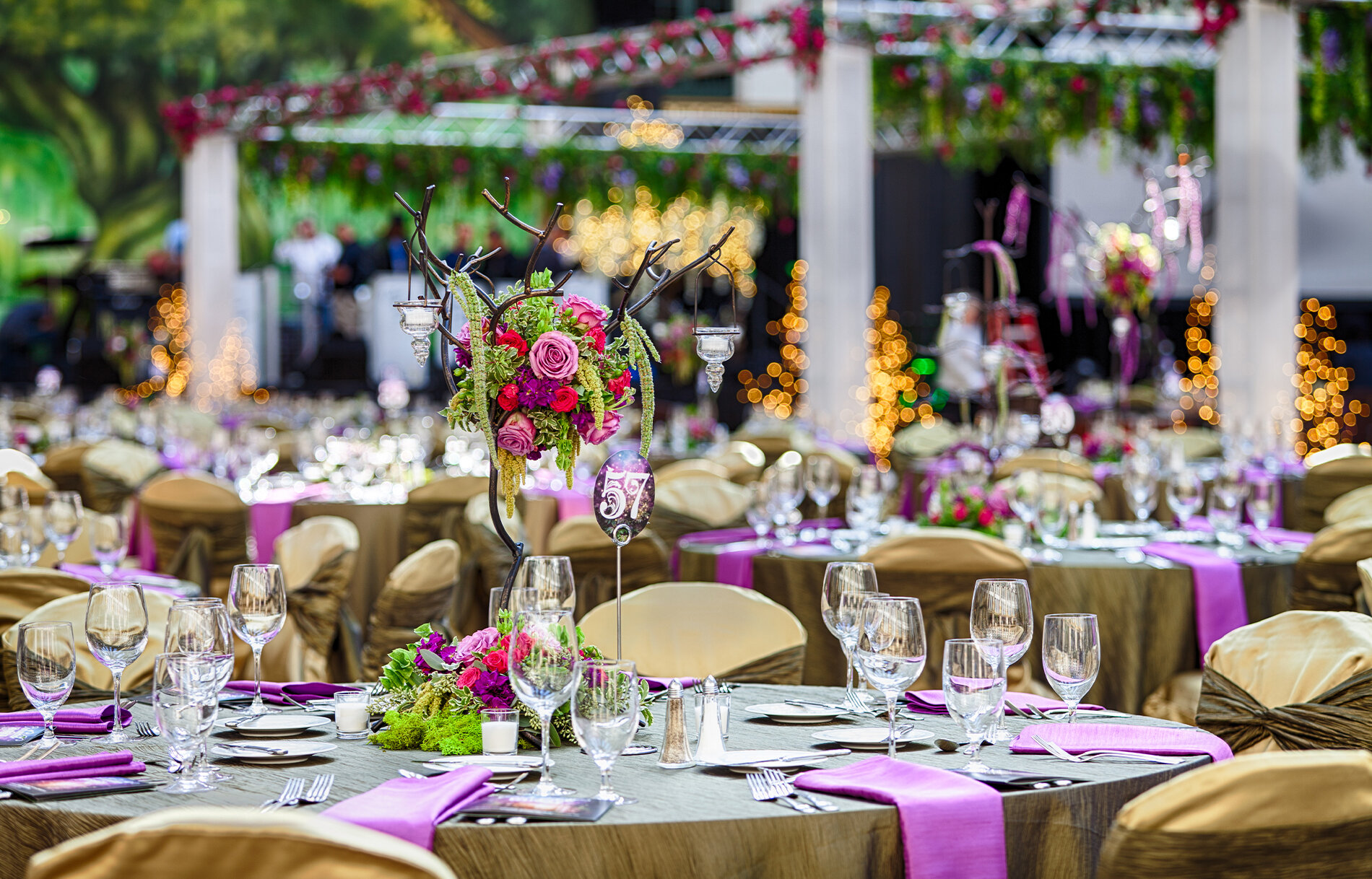 Purple banquet table floral arrangements
