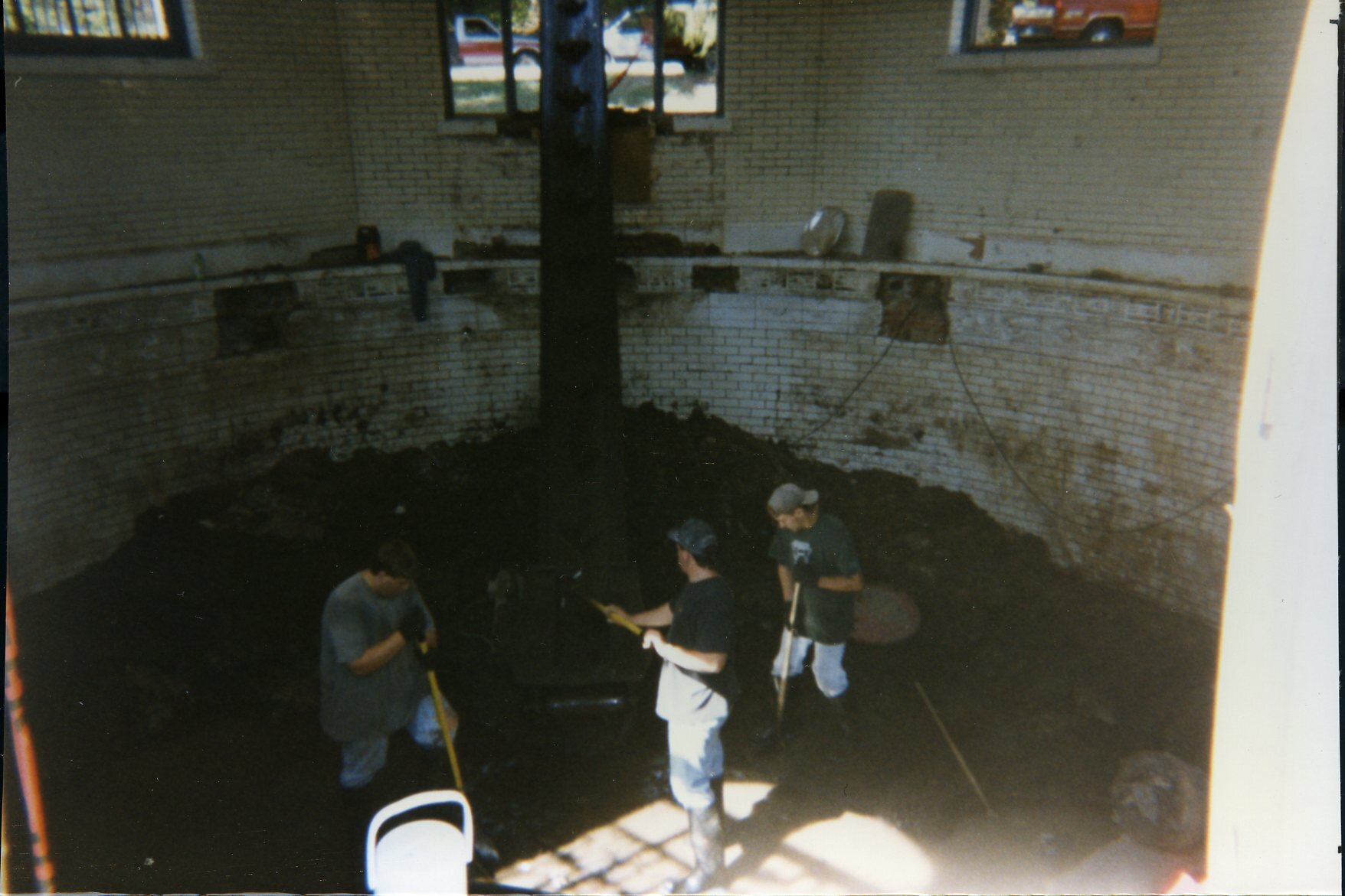 a group of men working in a room
