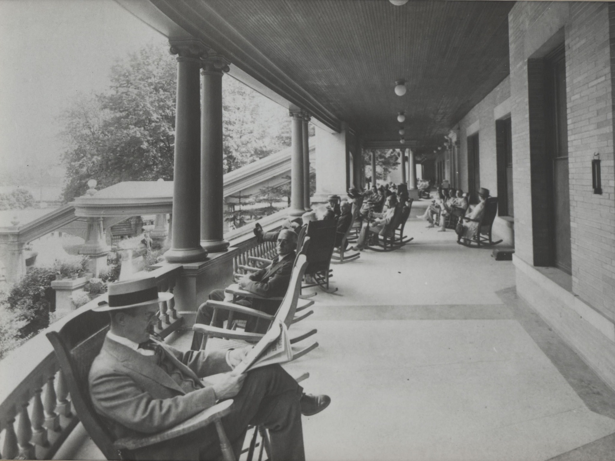 a group of people sitting on chairs