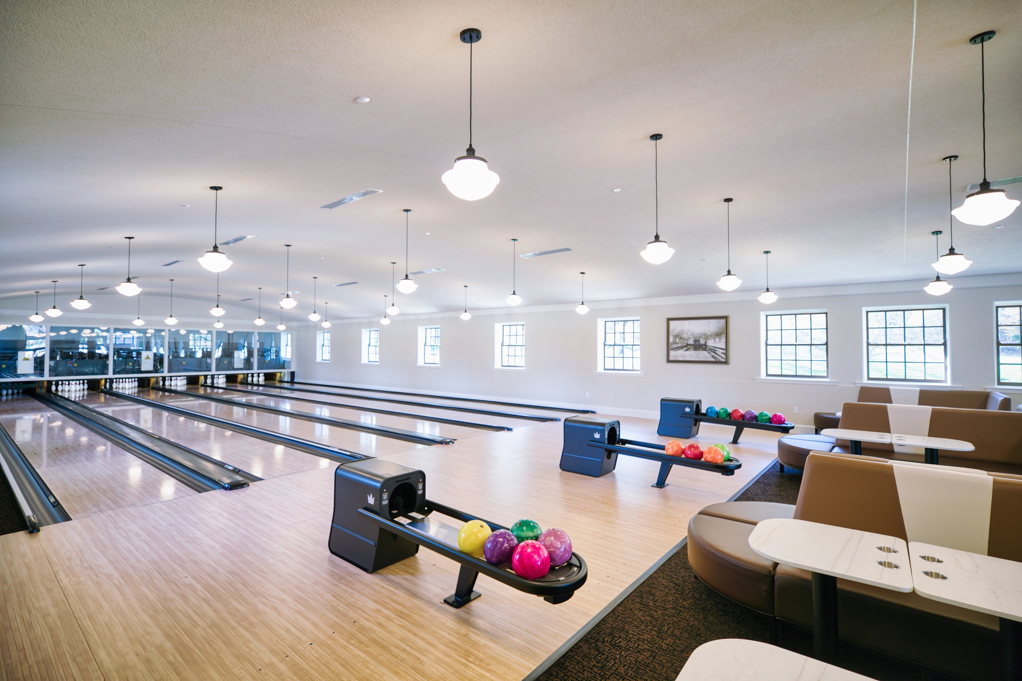 a bowling alley with bowling balls in it