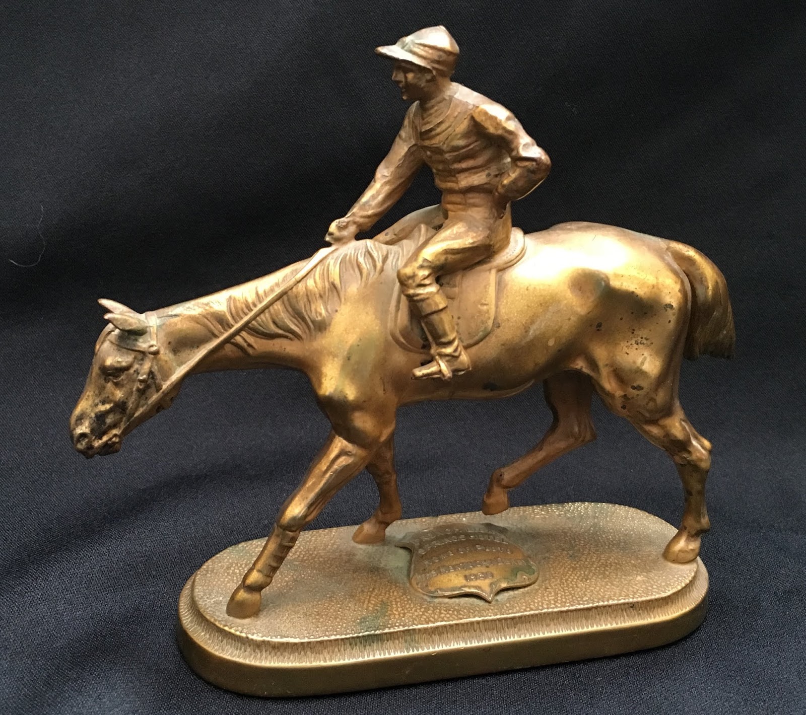 a statue of a man riding a horse
