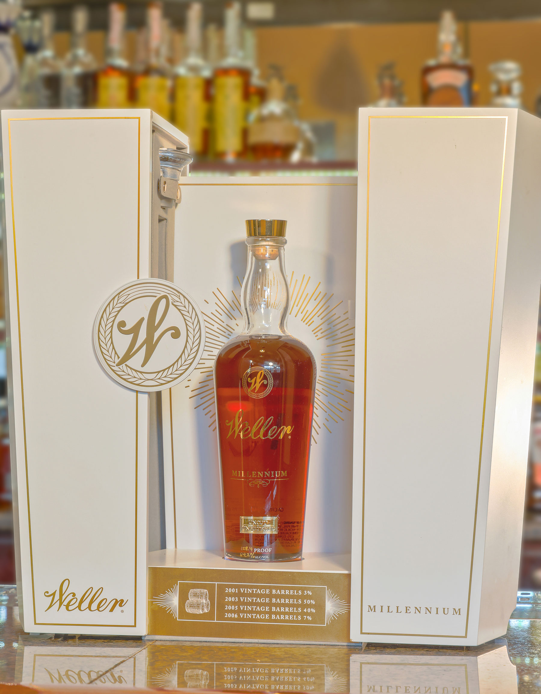 a bottle of alcohol in a white box