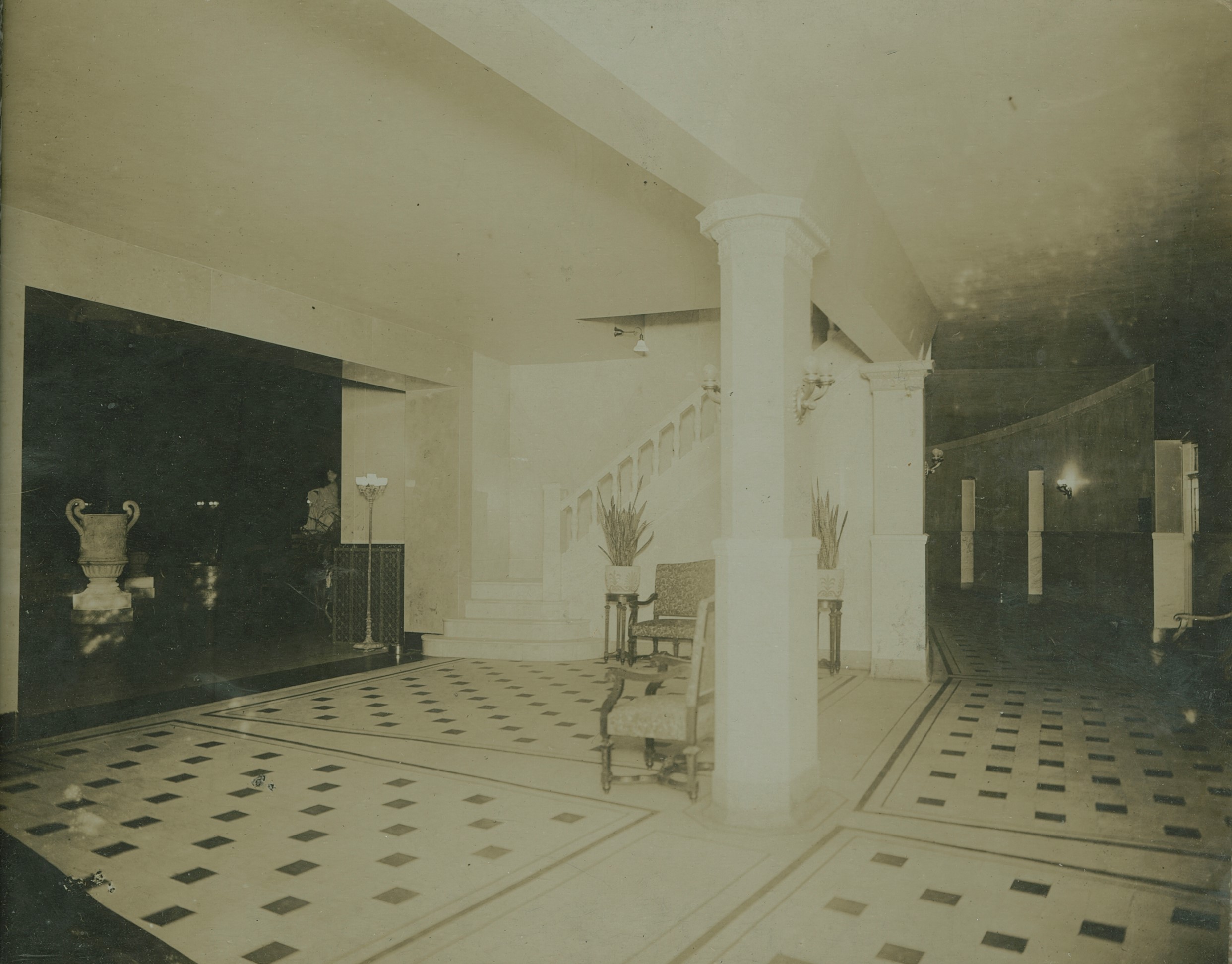a black and white photo of a hall