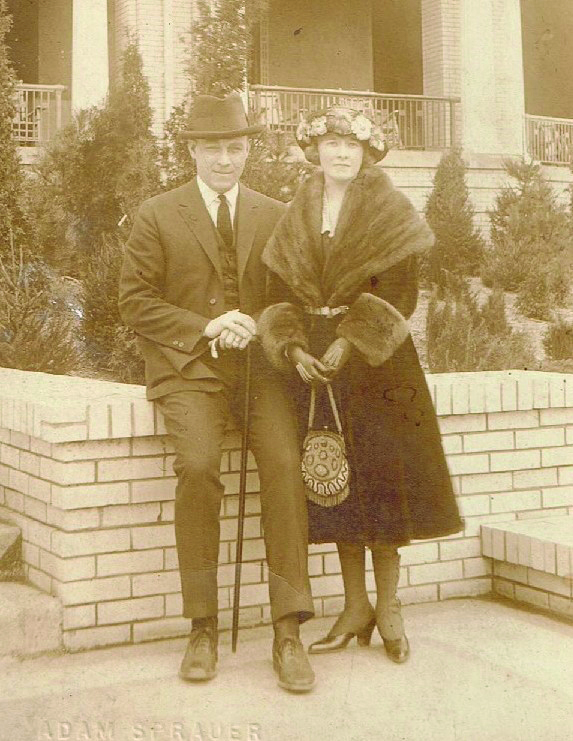 a man and woman posing for a picture