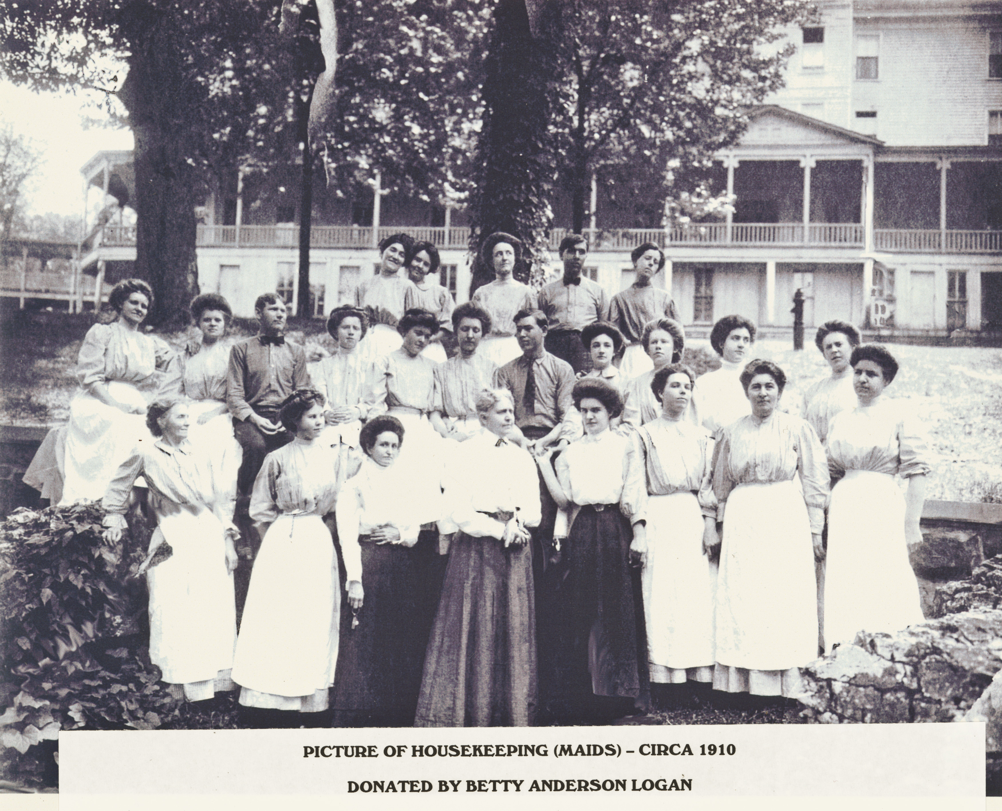 a group of women in white dresses
