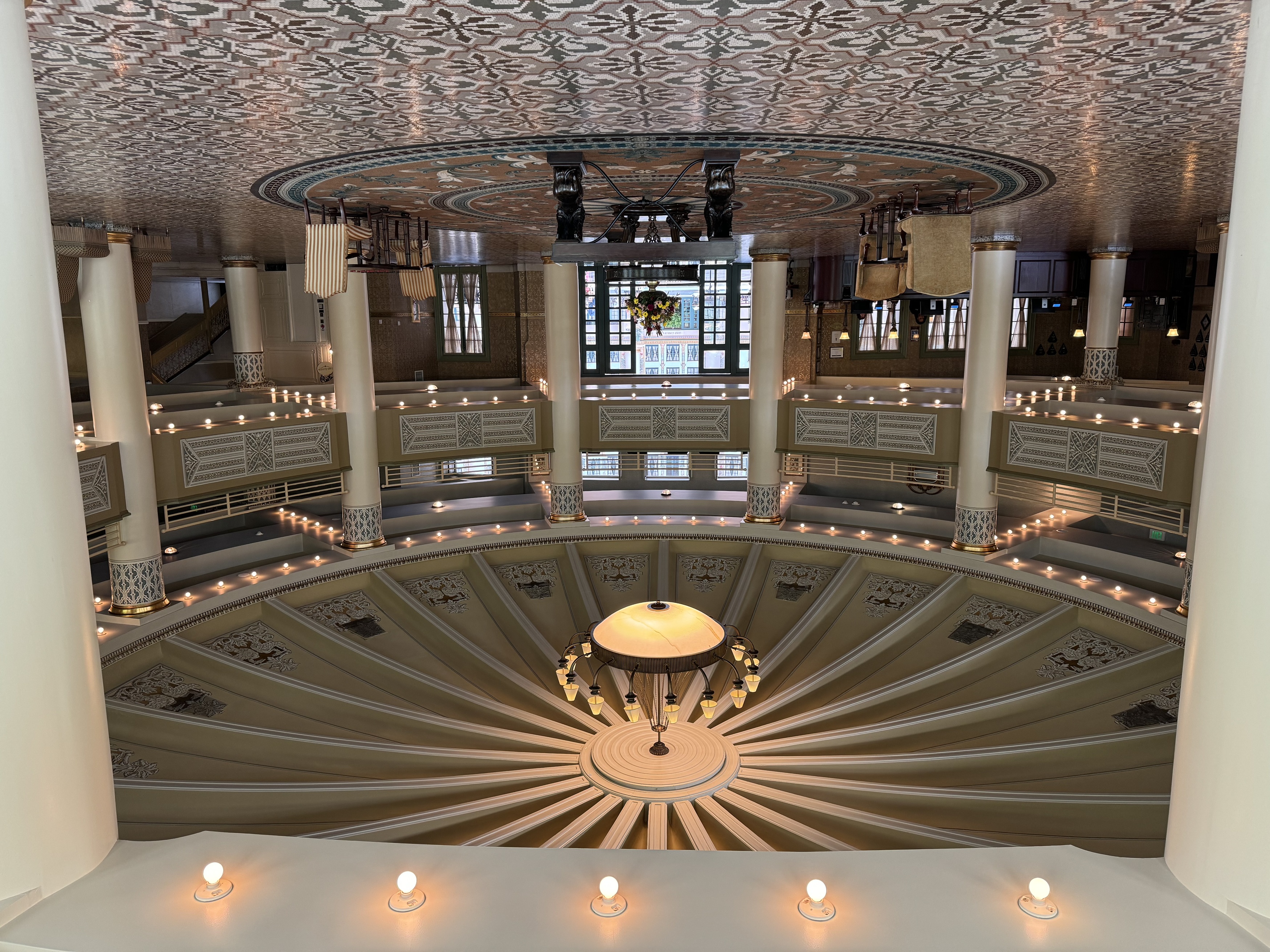 a large room with a large ceiling and a chandelier