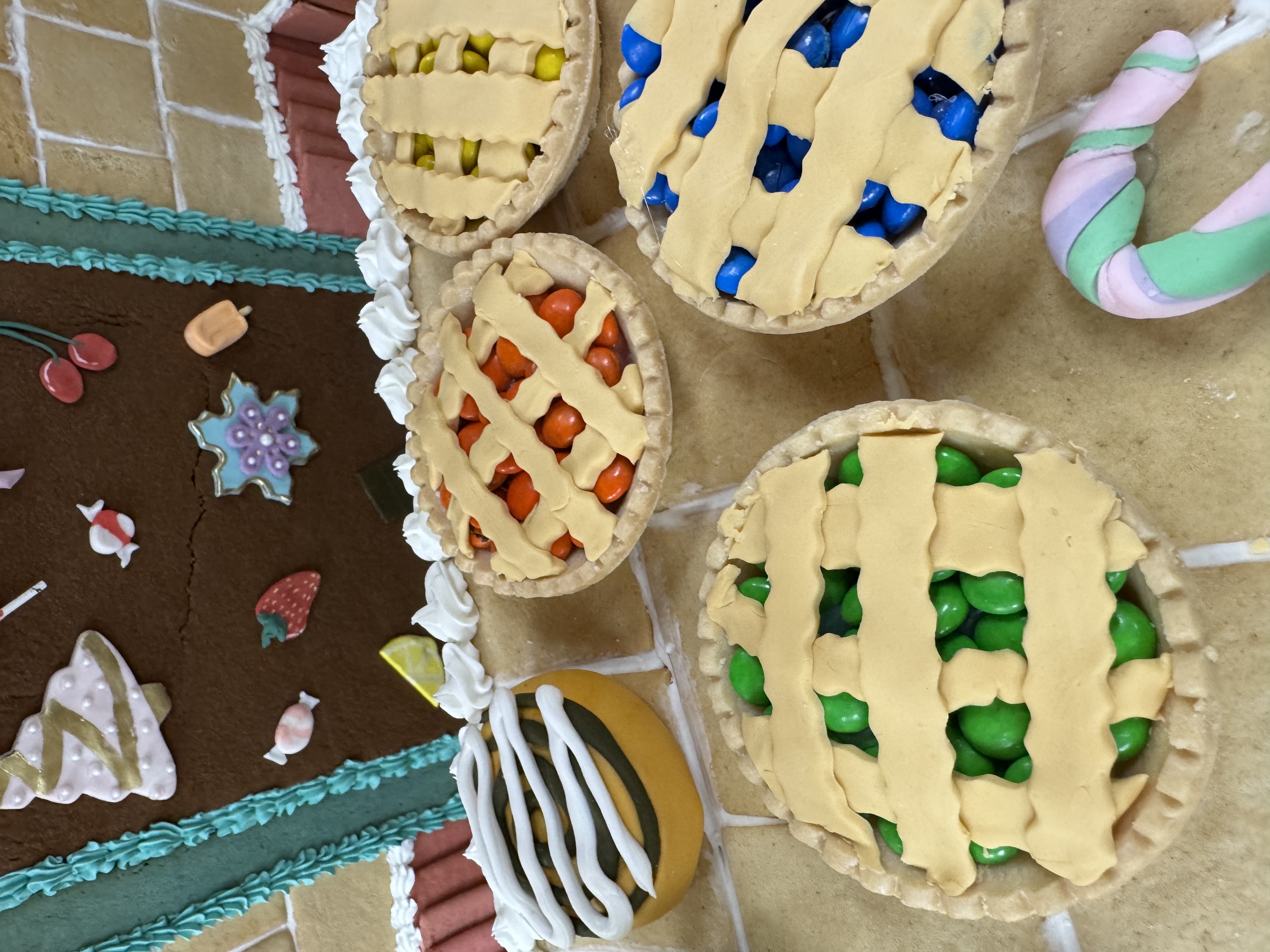 a group of pies with different colored toppings