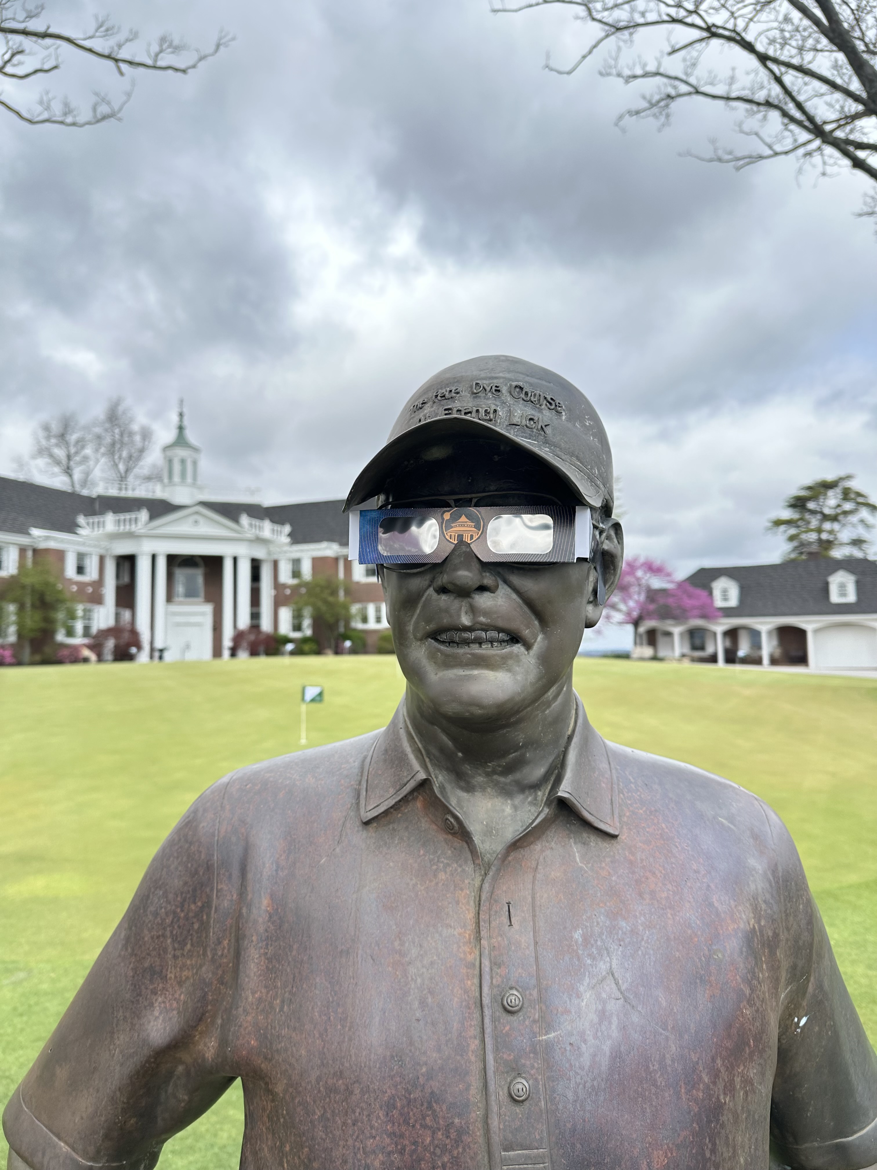 a statue of a man wearing sunglasses