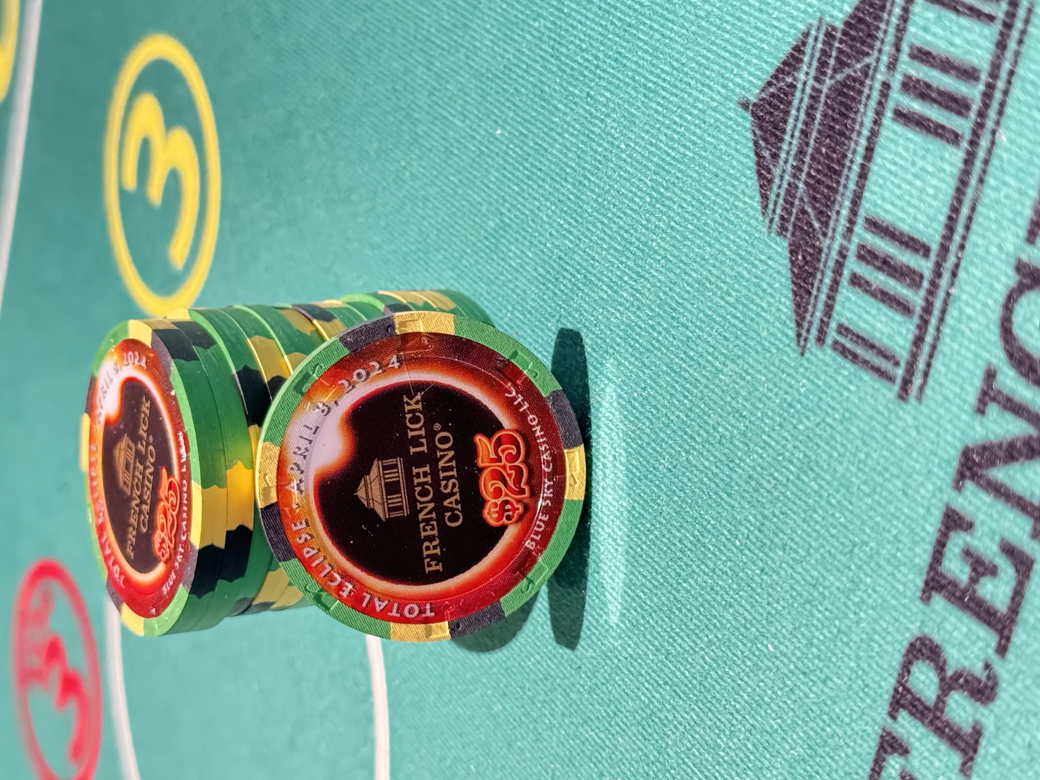 a stack of poker chips on a table