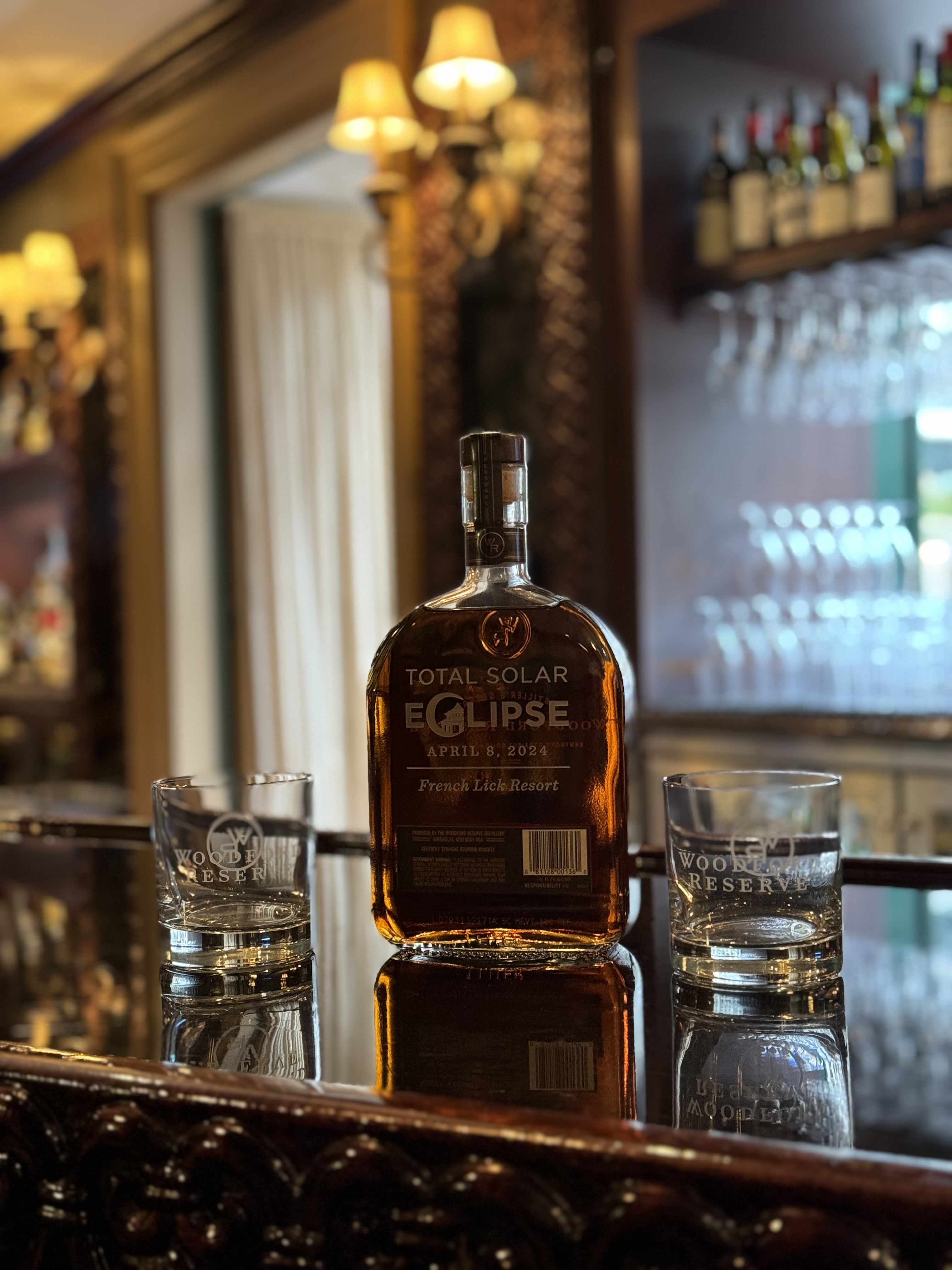 a bottle of alcohol on a bar counter