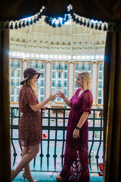 ladies cheers-ing on west baden springs balcony