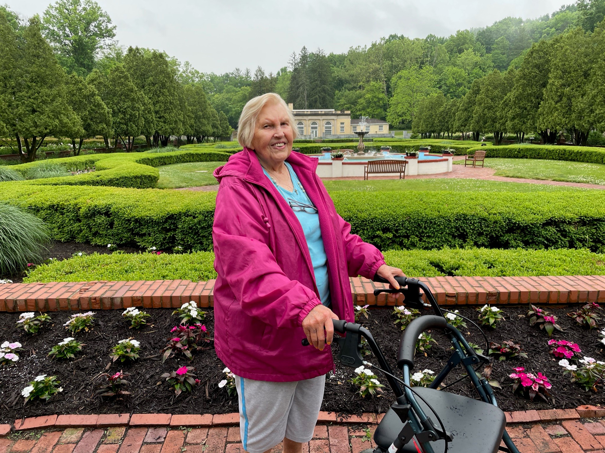 A woman standing in gardens