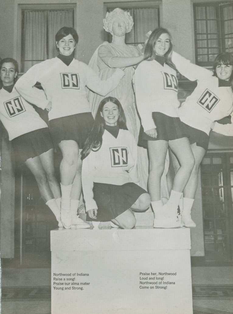 a group of girls posing for a photo