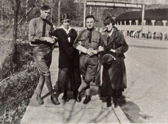 soldiers and nurses arm and arm