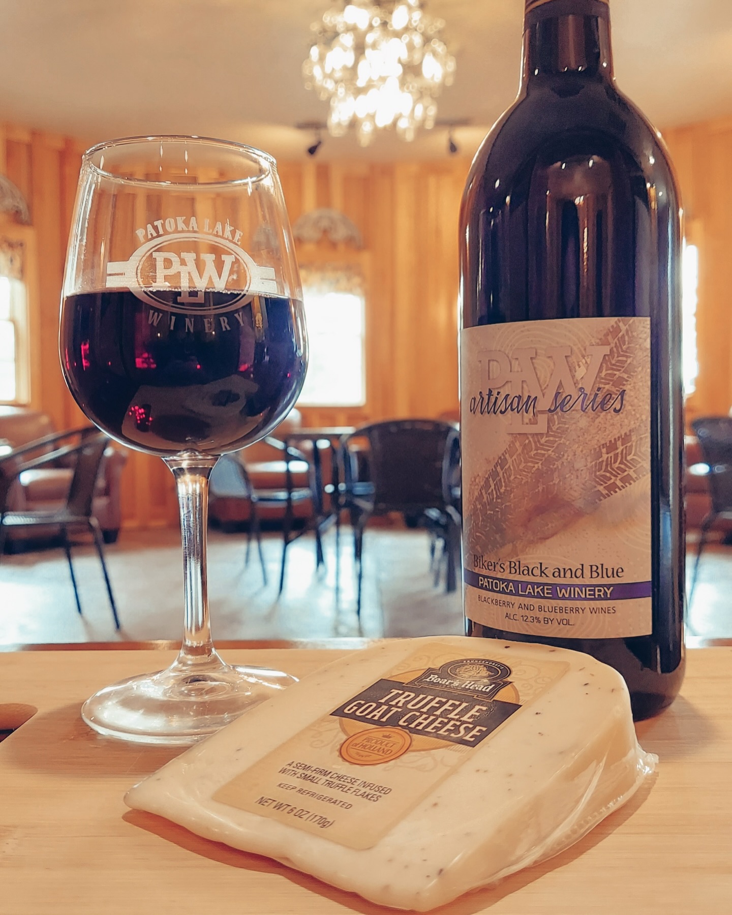 a bottle of wine and a glass of wine
