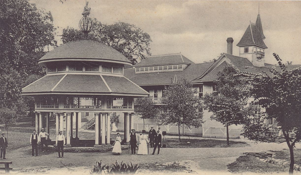 a group of people standing in front of a building