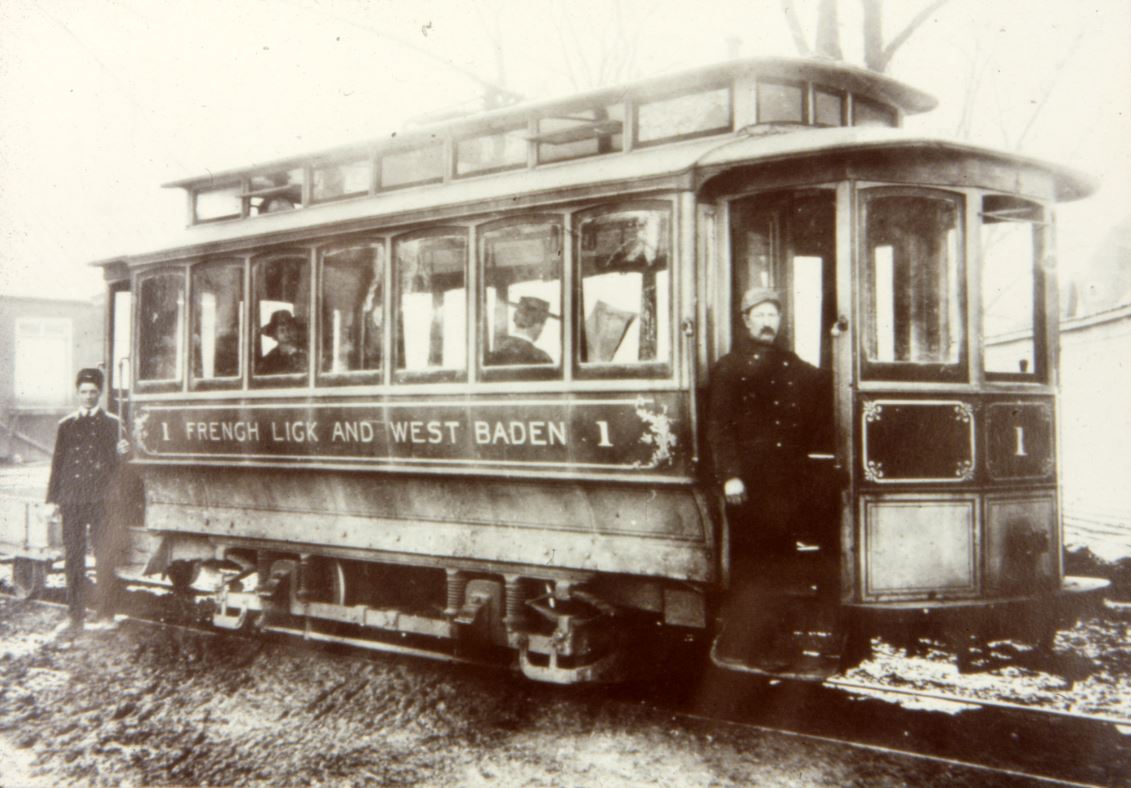a man standing in a train car