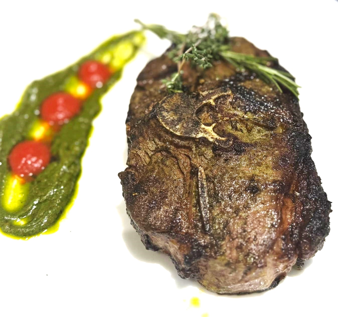 a piece of meat with sauce