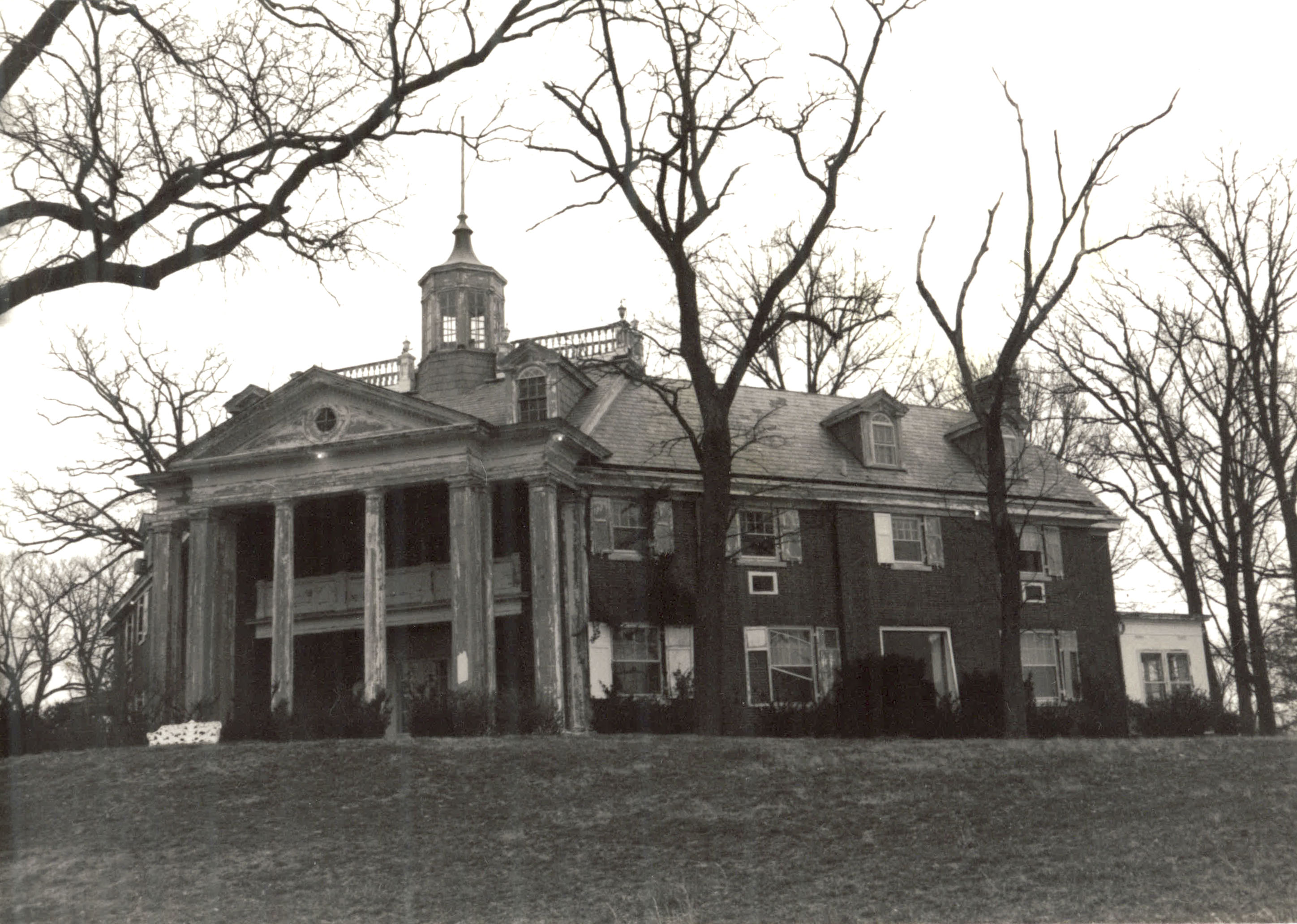 a building with columns and a tower