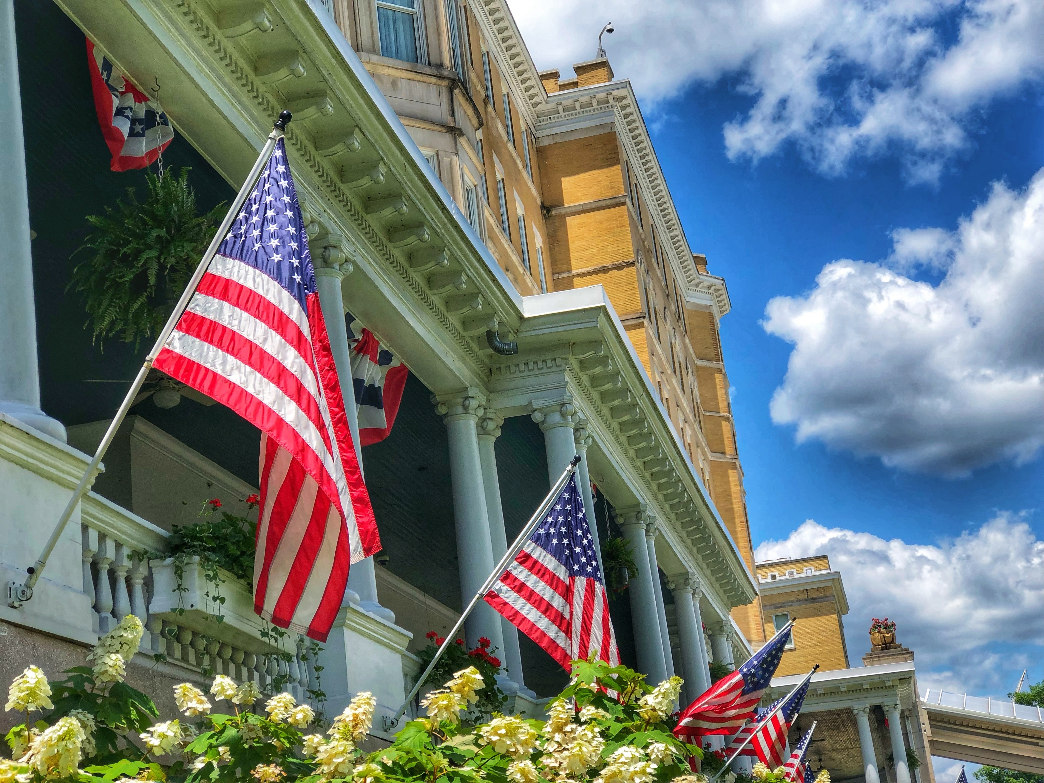 Flags hanging outside a hotel