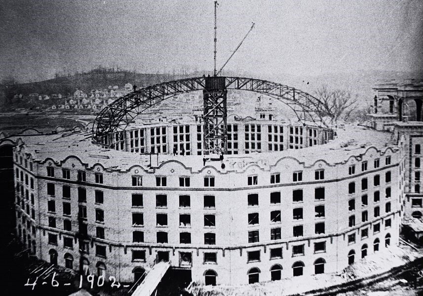 a building under construction with a crane