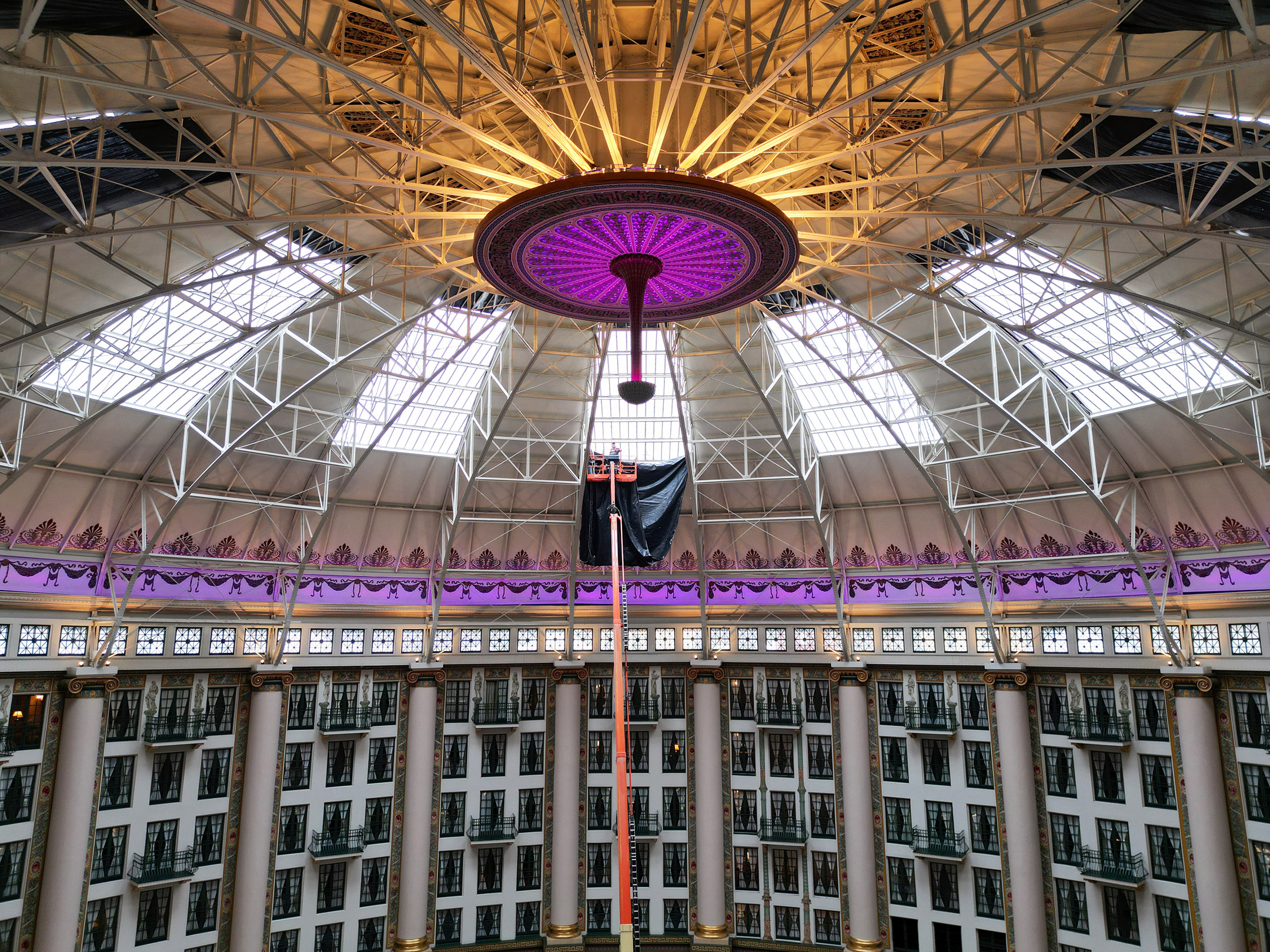 a round building with a purple light