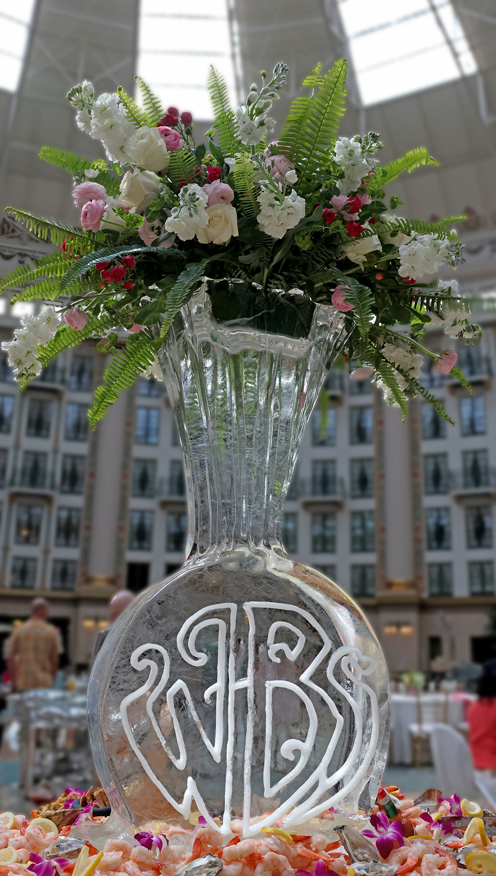 a vase of flowers in a building