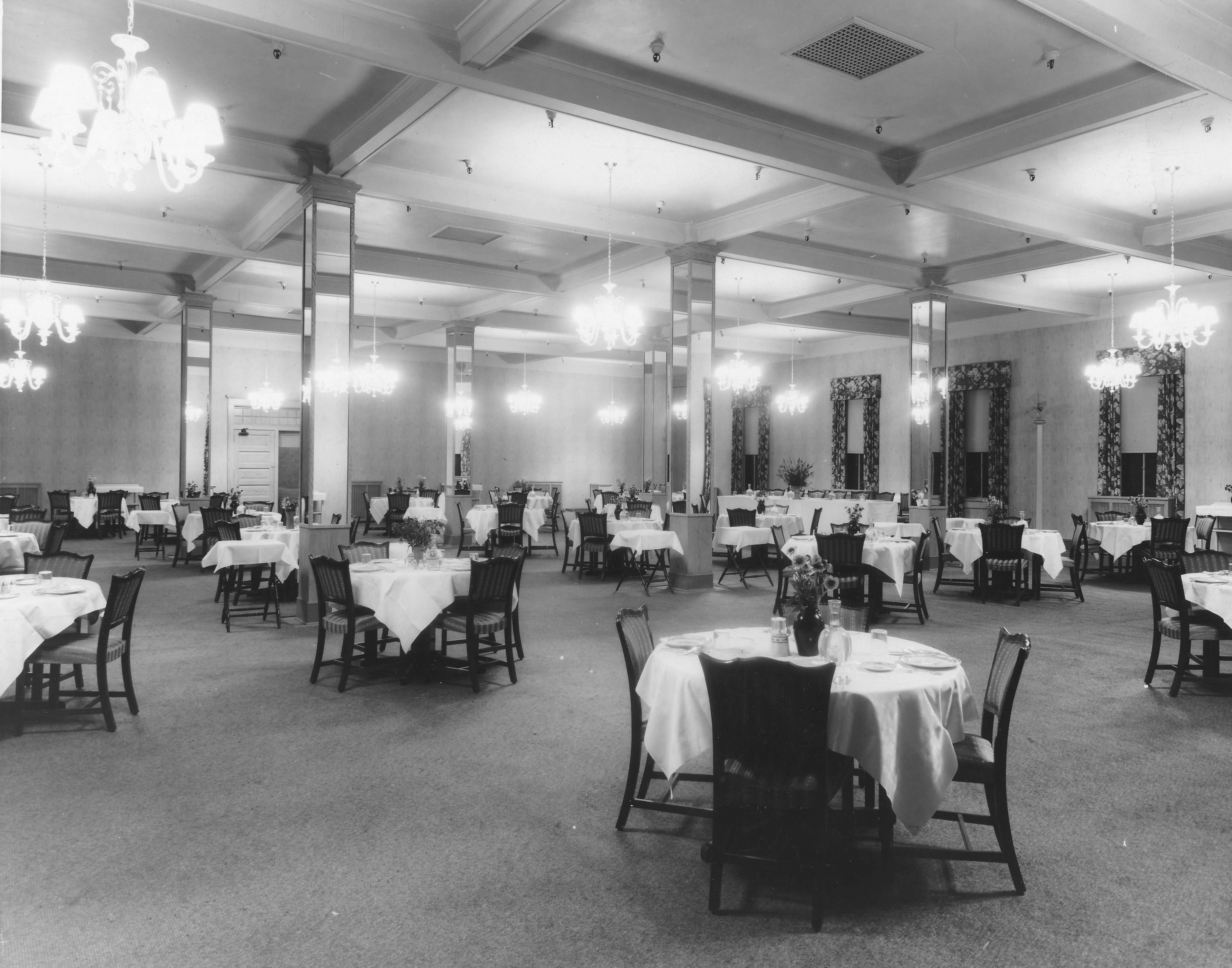 a room with tables and chairs
