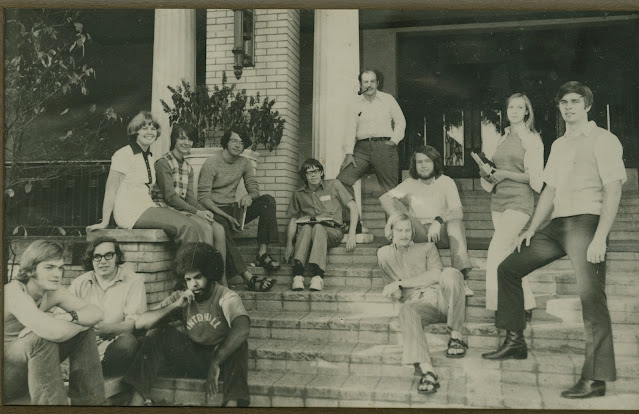 friends sitting on a stoop