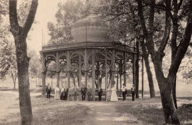 old wooden neptune spring house